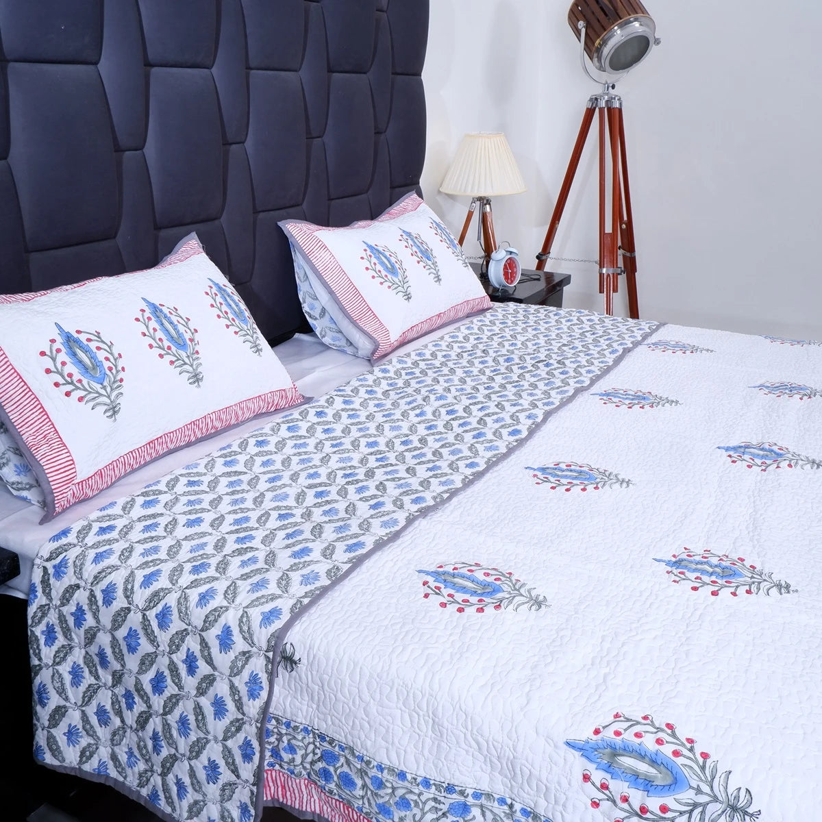 Hand block print cotton bedcover with colorful floral patterns for stylish bedroom decor